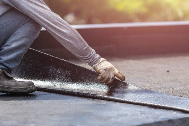 Professional Basement Waterproofing technician working in Arab, AL